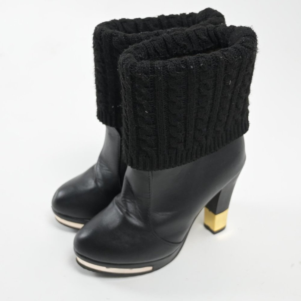 Leather heeled boots with Gold details